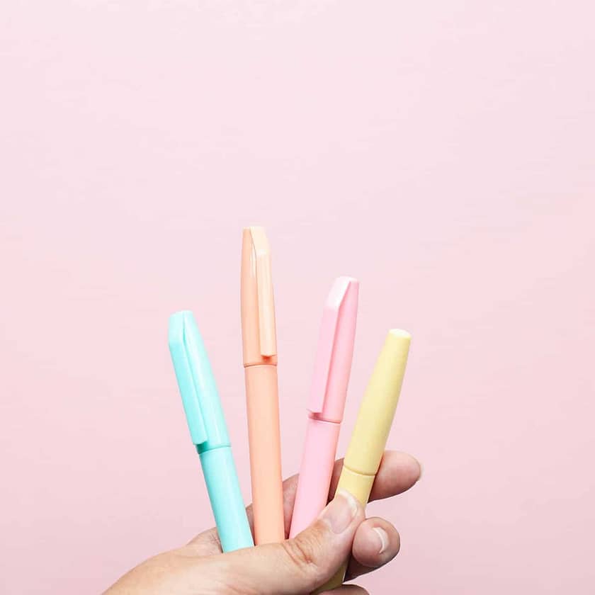 four assorted-color pens